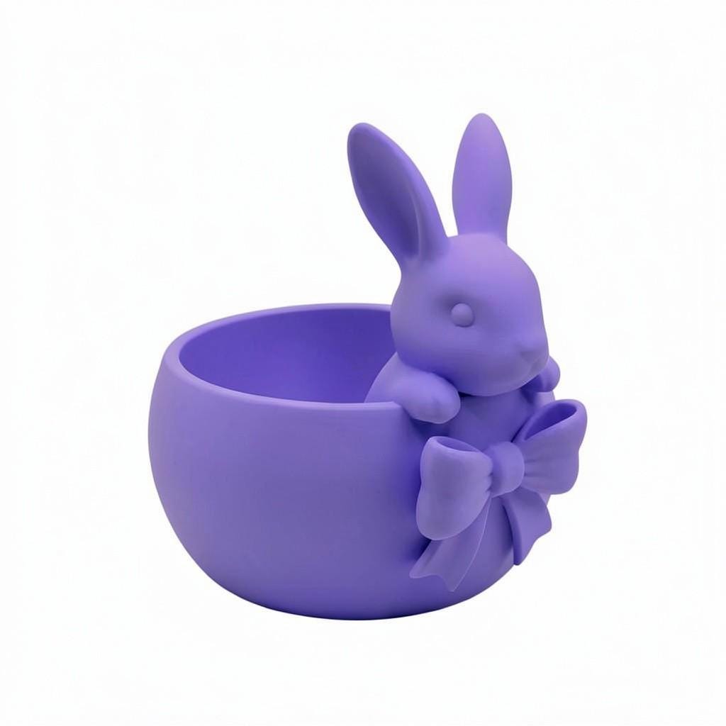 Pink Easter bowl with a bunny and bow detail, used as a cute candy dish for Easter eggs, chocolates, and spring table decor.