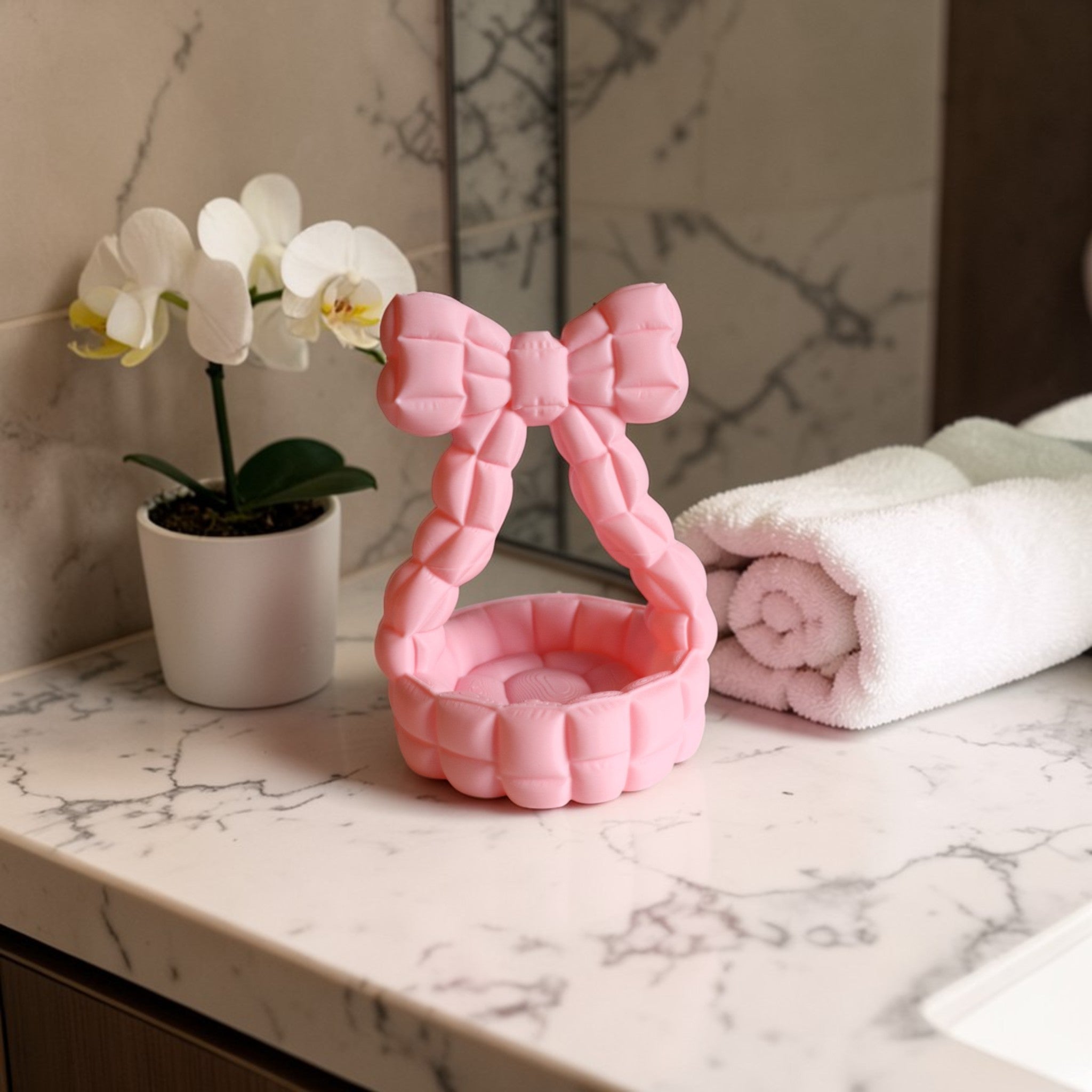 Quilted bow catchall basket used as jewelry dish on vanity, cute aesthetic decor
Pink bow jewelry holder with padded handle, decorative trinket dish for nightstand
Bow shaped quilted basket for rings and earrings, feminine desk and vanity organizer
Aesthetic bow catchall basket with quilted texture, stylish storage for small essentials