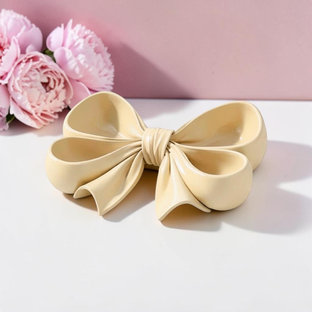 pink bow tray coquette decor vanity organiser
feminine jewelry dish bow shape pink tray
cute pink tray for rings and earrings storage
girly vanity setup with bow tray organizer