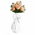 Pink bow vase with flowers on a feminine vanity setup with pink accents
Cute girly pink vase with bow design displayed with roses
Coquette aesthetic pink flower vase for desk or room decor
Feminine home decor pink vase styled on a vanity table
Pink decorative vase with bow detail for flowers and gifts