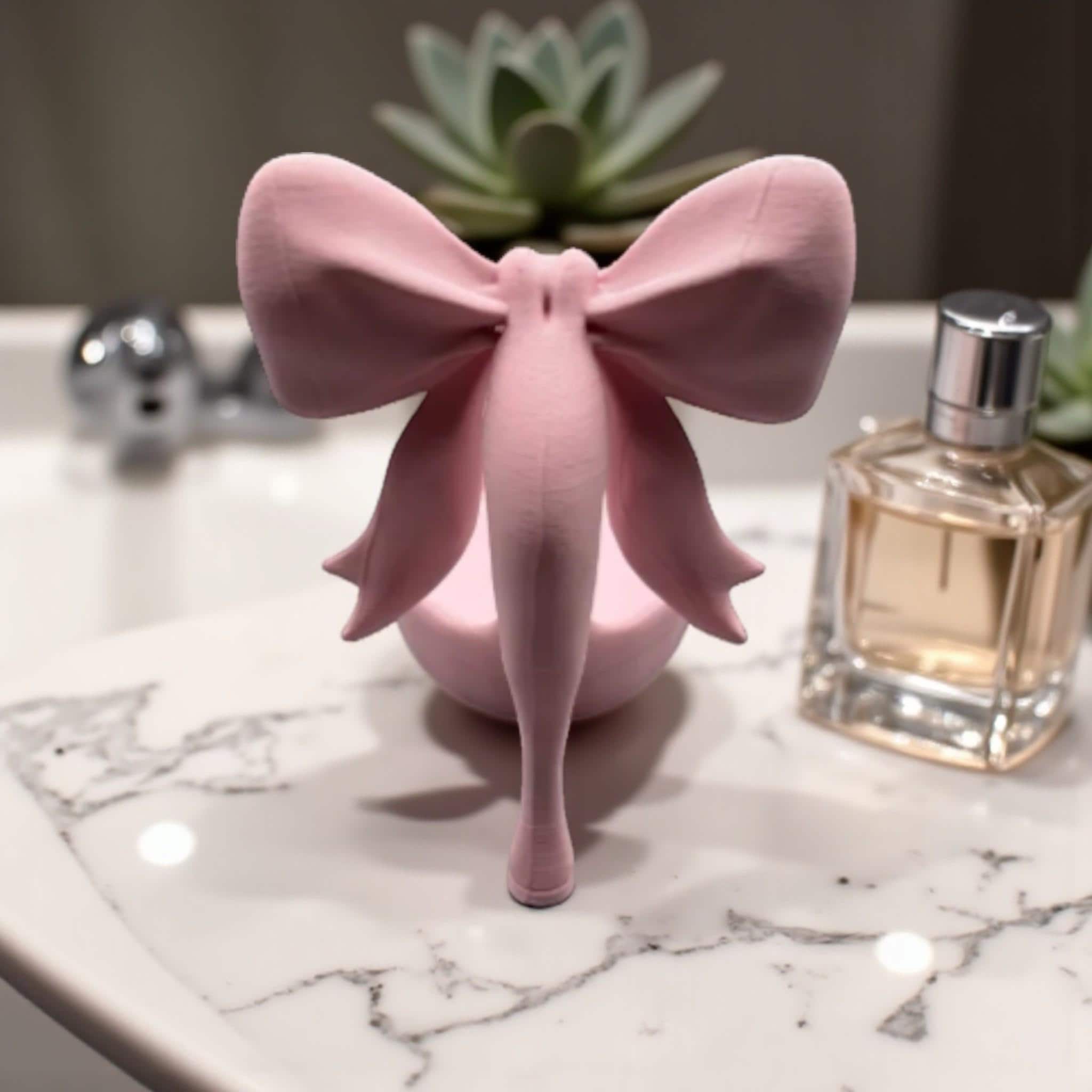 Organise your jewellery with this coquette bow jewelry tray, a pink ring dish perfect for storing rings, earrings, and small accessories.