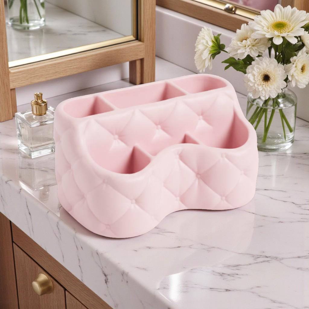 Organise your beauty space with this pink quilted vanity organizer tray, perfect for storing makeup, cosmetics, and everyday essentials.
