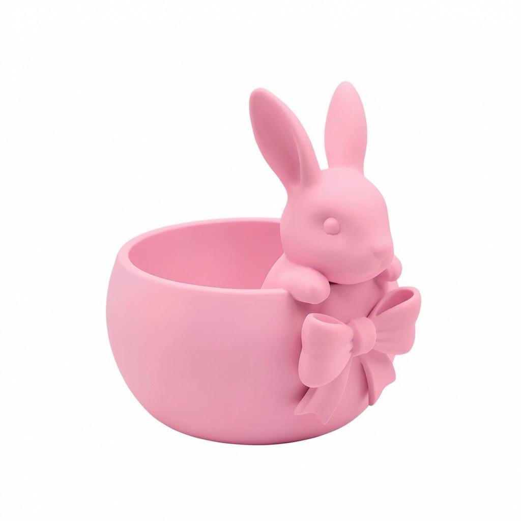 Pink Easter bowl with a bunny and bow detail, used as a cute candy dish for Easter eggs, chocolates, and spring table decor.