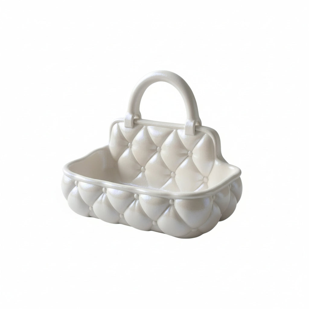 Quilted catchall basket with tufted detailing on vanity countertop, plush makeup and skincare organizer
Soft padded vanity basket with handle holding makeup brushes and skincare bottles
Decorative quilted organizer basket for bathroom or dresser storage
Aesthetic vanity catchall basket used for jewelry, makeup, and daily essentials