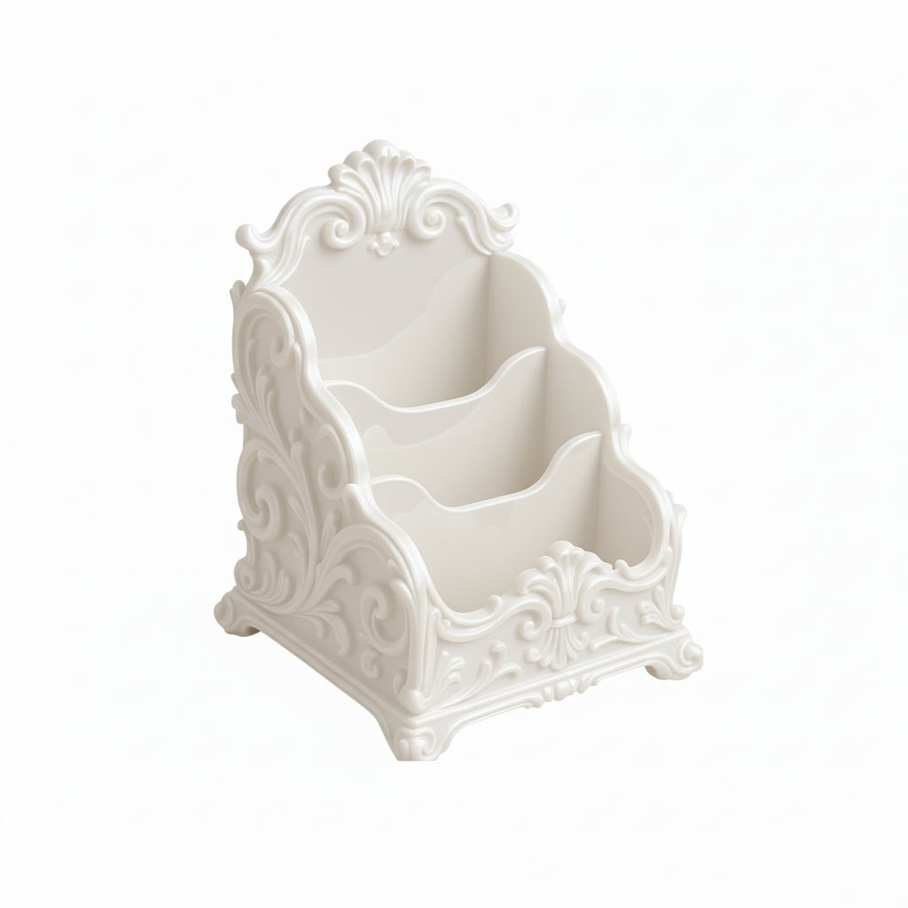 Pink baroque desk organizer with rococo detailing, used as a makeup brush holder and letter organizer on a luxury home office desk.