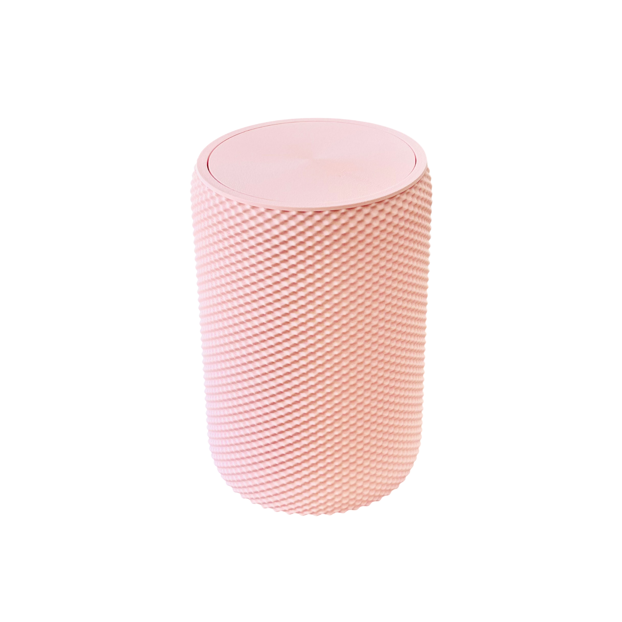 Pink vanity bin with textured design placed on wooden vanity table