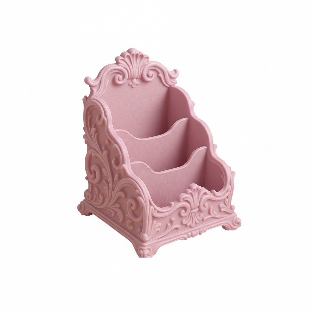 Pink baroque desk organizer with rococo detailing, used as a makeup brush holder and letter organizer on a luxury home office desk.