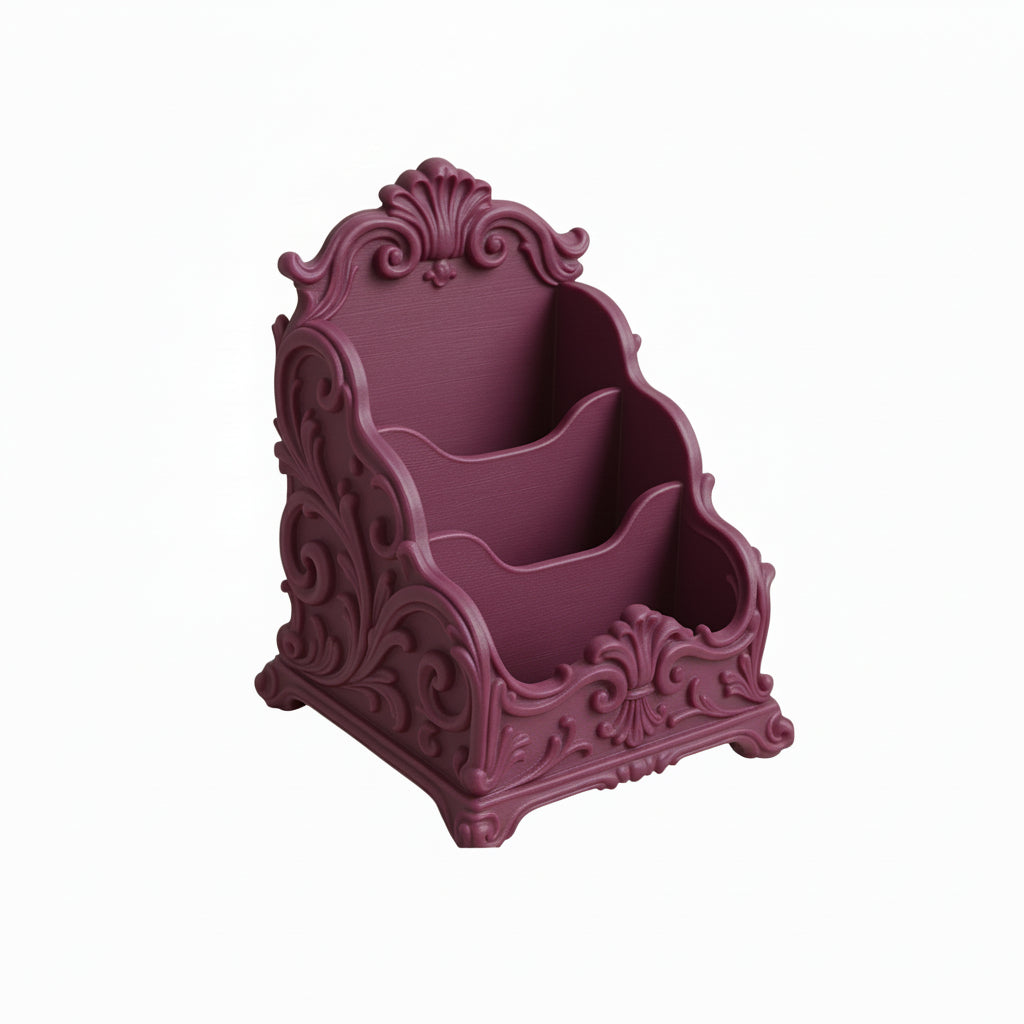Pink baroque desk organizer with rococo detailing, used as a makeup brush holder and letter organizer on a luxury home office desk.