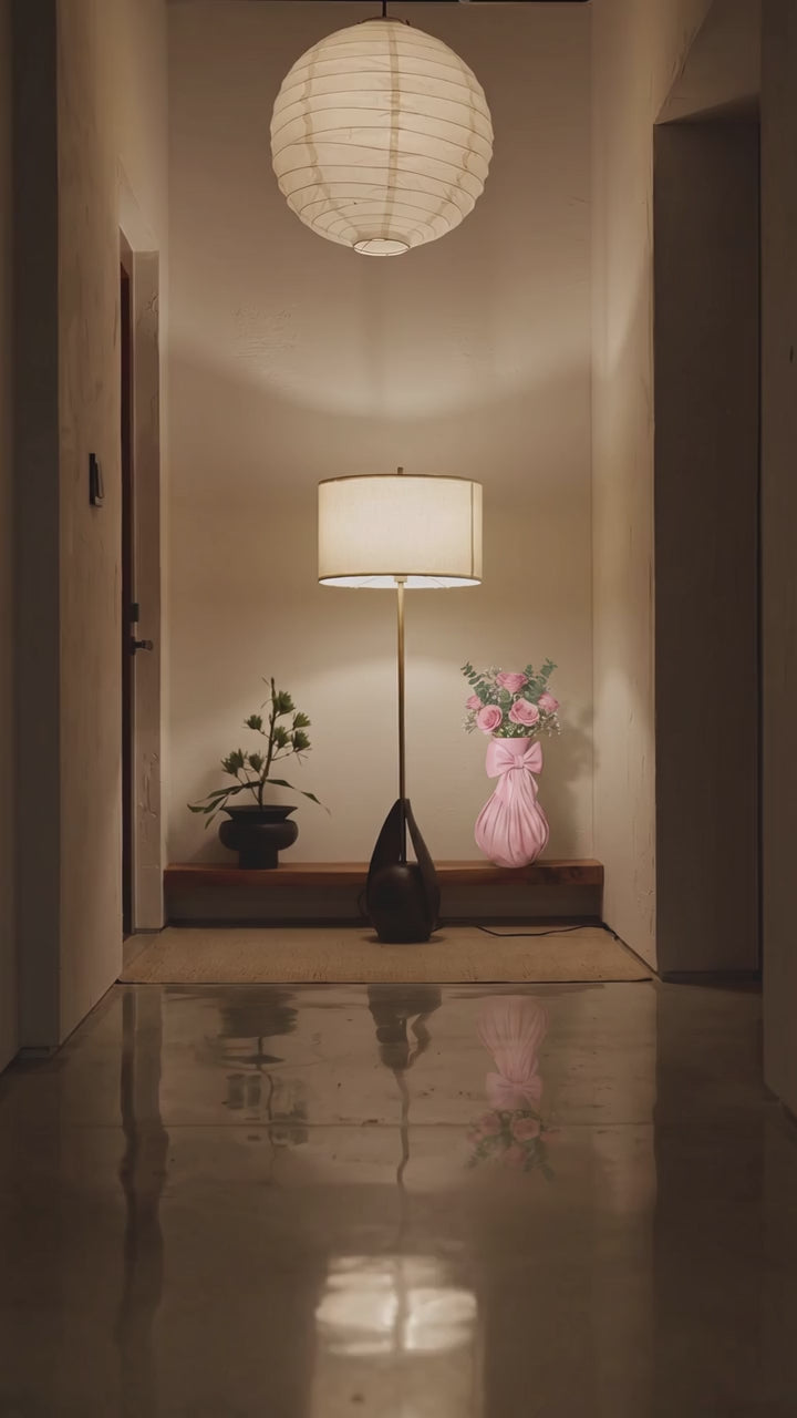 Pink bow vase with flowers on a feminine vanity setup with pink accents
Cute girly pink vase with bow design displayed with roses
Coquette aesthetic pink flower vase for desk or room decor
Feminine home decor pink vase styled on a vanity table
Pink decorative vase with bow detail for flowers and gifts