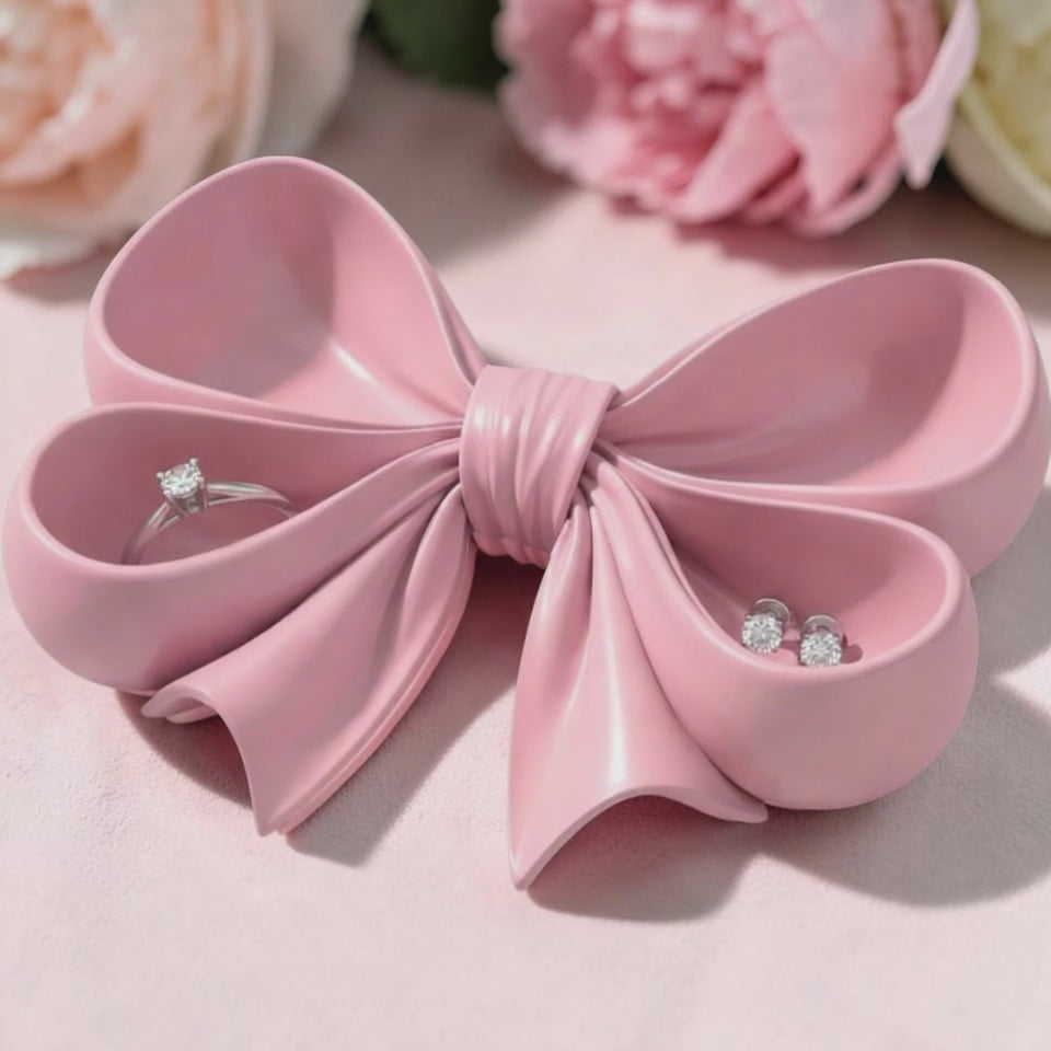pink bow tray coquette decor vanity organiser
feminine jewelry dish bow shape pink tray
cute pink tray for rings and earrings storage
girly vanity setup with bow tray organizer