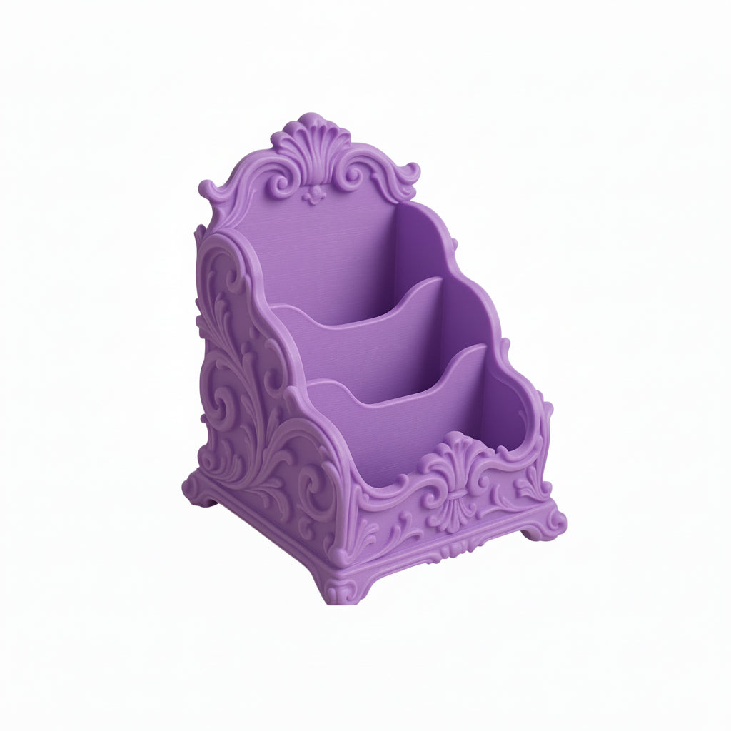 Pink baroque desk organizer with rococo detailing, used as a makeup brush holder and letter organizer on a luxury home office desk.