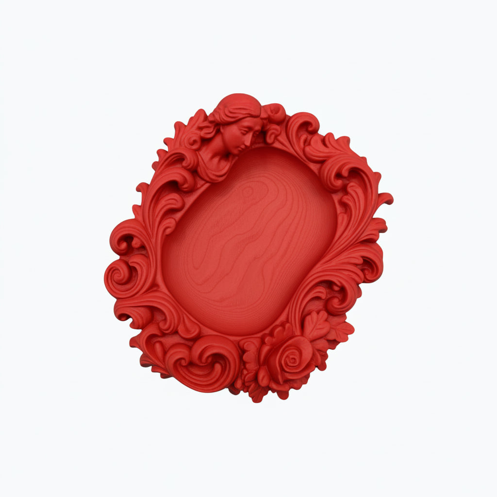 Pink rococo-style woman and rose catchall tray used as a jewelry dish, holding a gold ring, pearl earrings, and a necklace on a vanity surface.