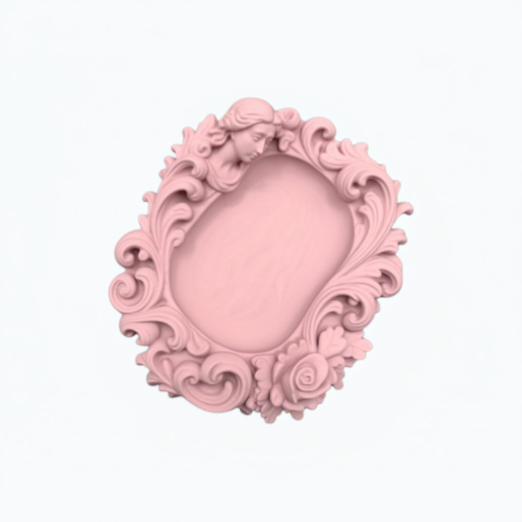 Pink rococo-style woman and rose catchall tray used as a jewelry dish, holding a gold ring, pearl earrings, and a necklace on a vanity surface.
