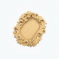 Pink rococo-style woman and rose catchall tray used as a jewelry dish, holding a gold ring, pearl earrings, and a necklace on a vanity surface.