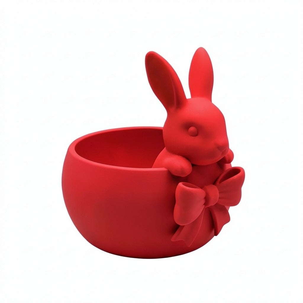 Pink Easter bowl with a bunny and bow detail, used as a cute candy dish for Easter eggs, chocolates, and spring table decor.
