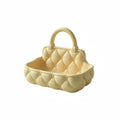Quilted catchall basket with tufted detailing on vanity countertop, plush makeup and skincare organizer
Soft padded vanity basket with handle holding makeup brushes and skincare bottles
Decorative quilted organizer basket for bathroom or dresser storage
Aesthetic vanity catchall basket used for jewelry, makeup, and daily essentials